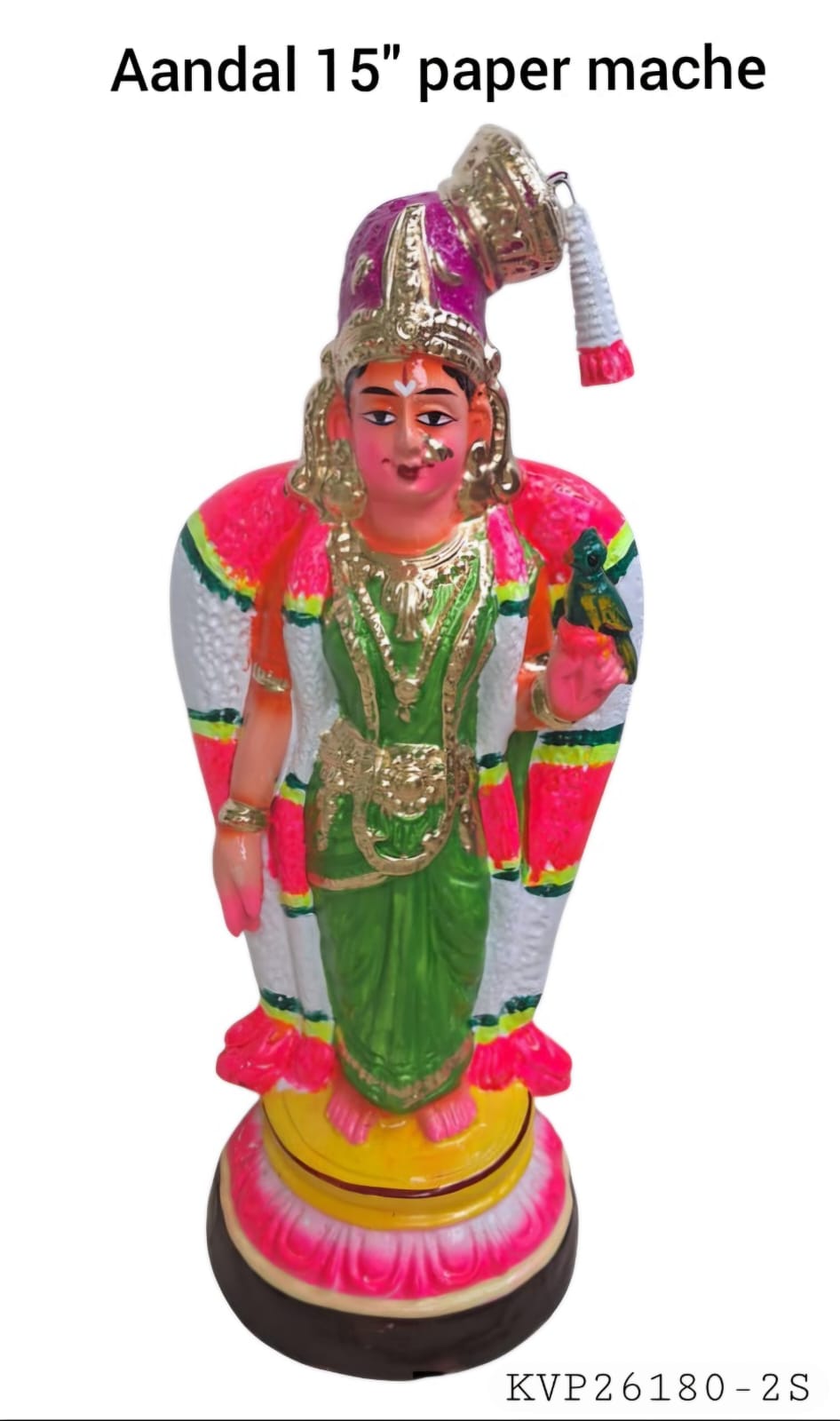 Colorful paper mache Aandal statue with decorative attire.