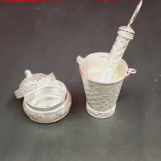 Celebrate Holi with a touch of elegance! This German Silver Holi Gift Bucket Pichkari Set is a perfect return gift for loved ones. Unique, festive, and beautifully crafted. Order now!