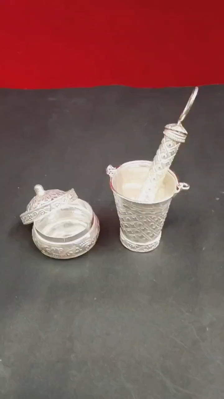 Celebrate Holi with a touch of elegance! This German Silver Holi Gift Bucket Pichkari Set is a perfect return gift for loved ones. Unique, festive, and beautifully crafted. Order now!
