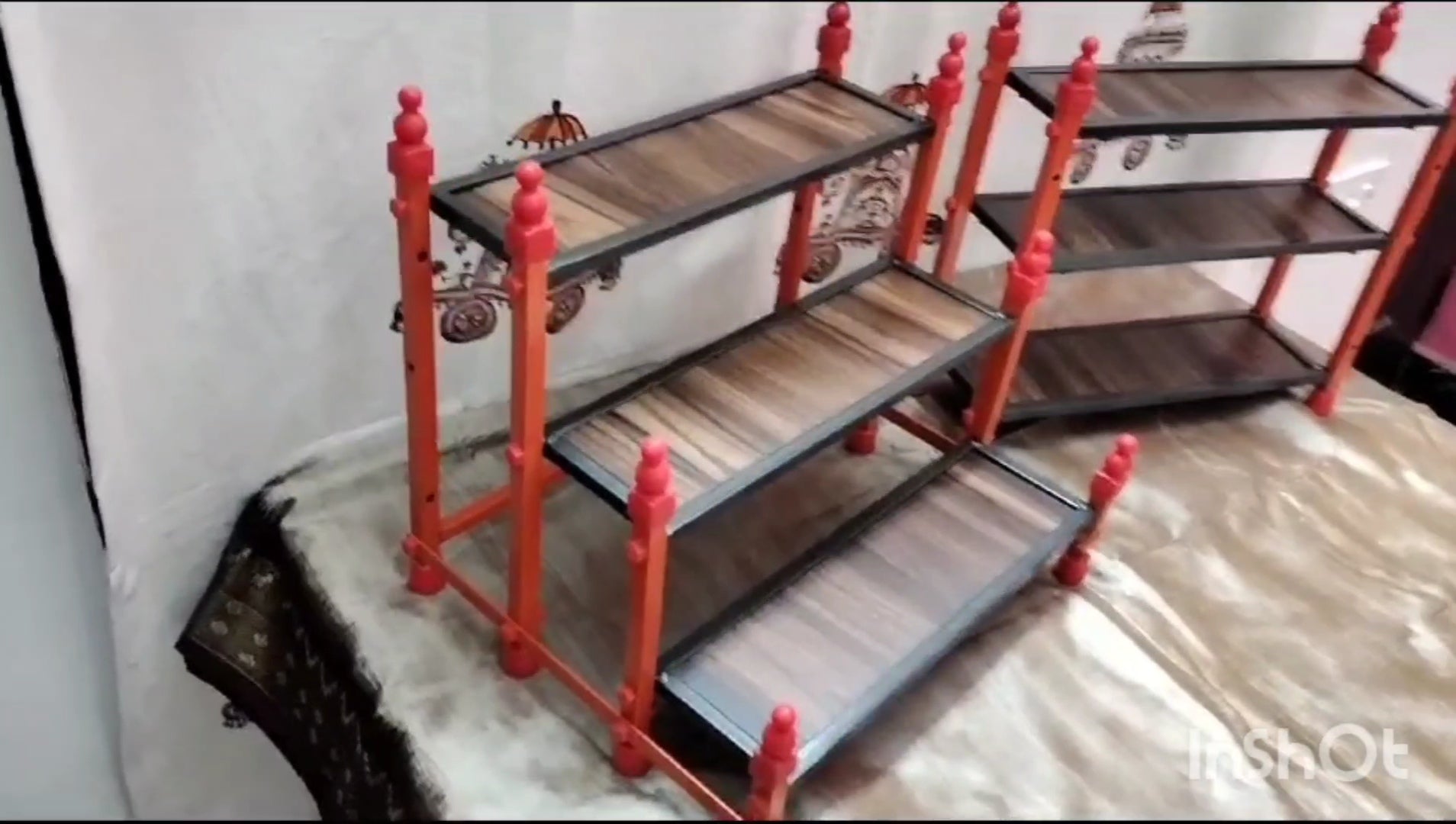 Three-tiered shelf for storage purposes